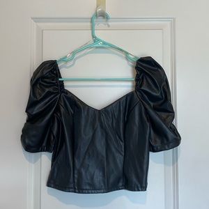 Brand is Haute Monde. Size is a medium.